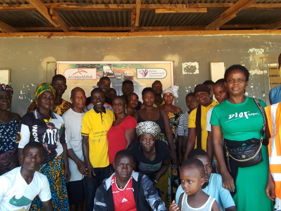 Local community residents at AML Phase II expansion town hall meeting in Karnplay City, Nimba